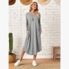 New European and American women's clothing, solid color knitted side seam straight through pocket, curved loose dress