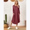 New European and American women's clothing, solid color knitted side seam straight through pocket, curved loose dress